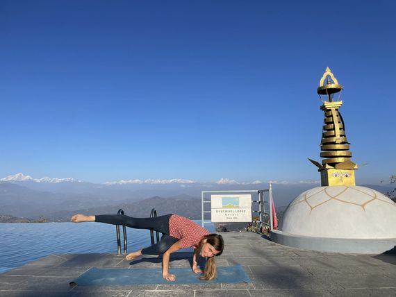 parsva bakasana near stupa